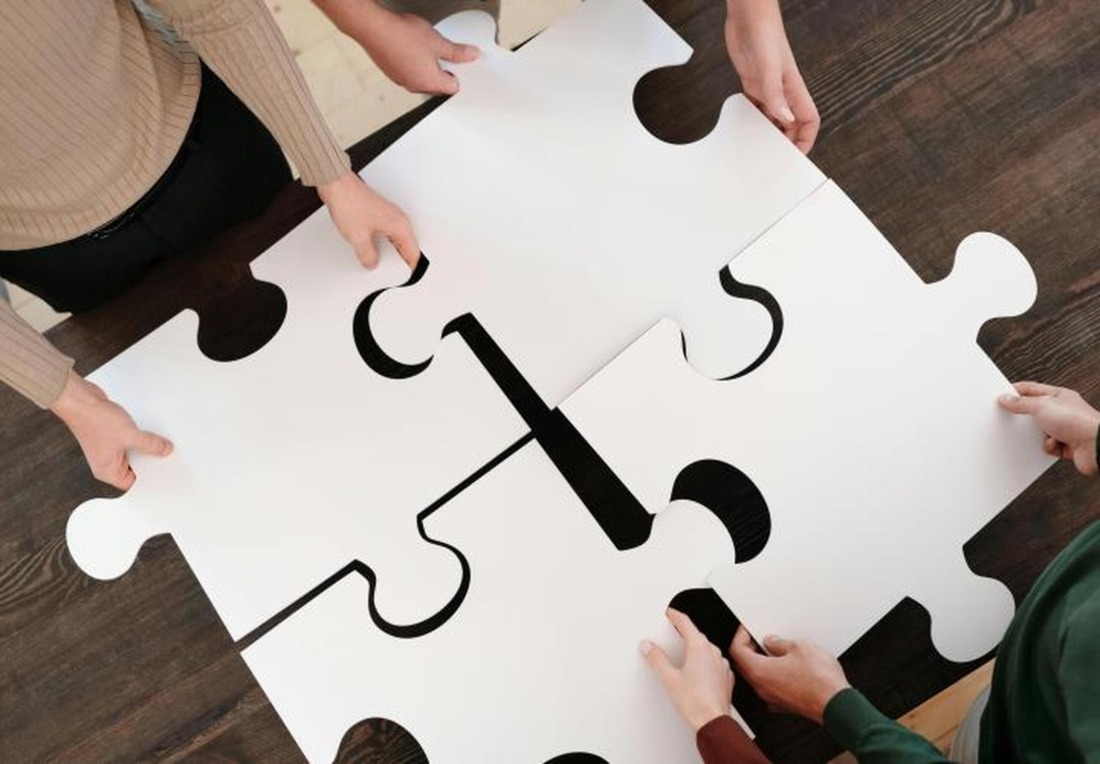 Puzzelstukken als symbool voor samenwerking